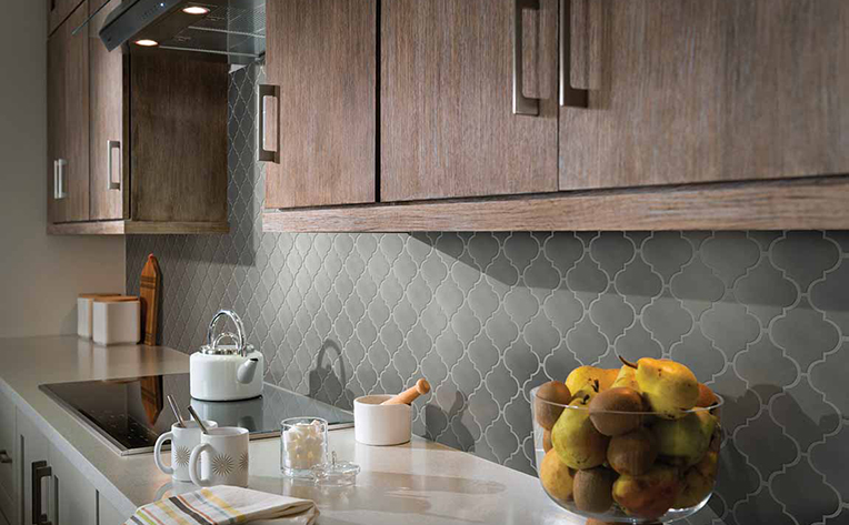 Kitchen backsplash with decorative grey tiles